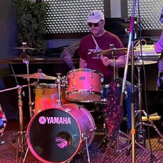 Jack Corder  drums and percussion/ backing vocals